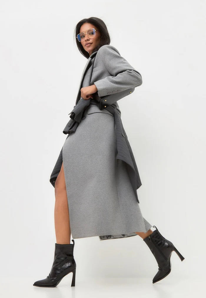 A pair of stylish women's high heel ankle boots in black, known as Tiana black boots, perfect for elevating any outfit.