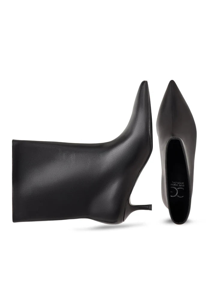 A stylish pair of black ankle boots with kitten heels, known as Regina boots, perfect for women's fashion.