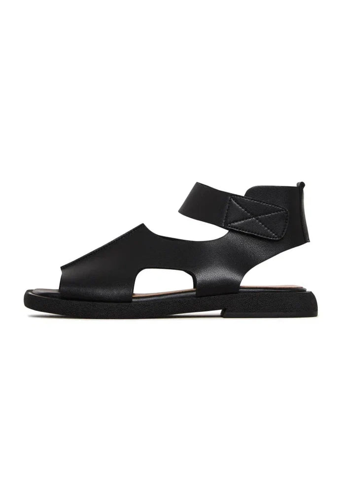 A stylish pair of black leather ankle strap sandals for a chic and sophisticated look.