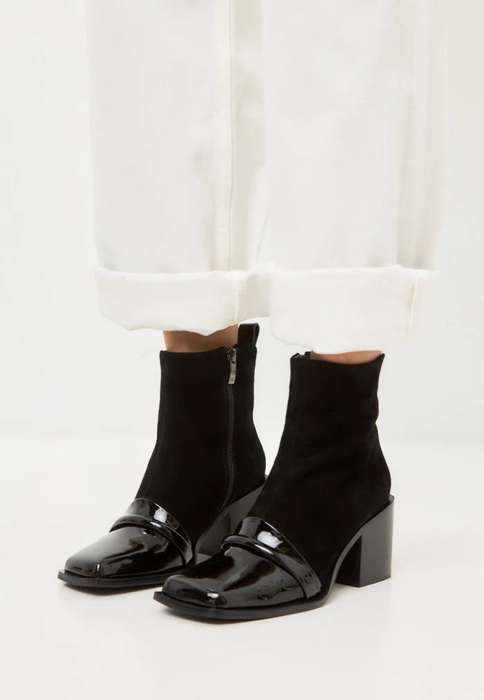 A stylish pair of black block heel ankle boots, the Wren ankle boots, perfect for any outfit.