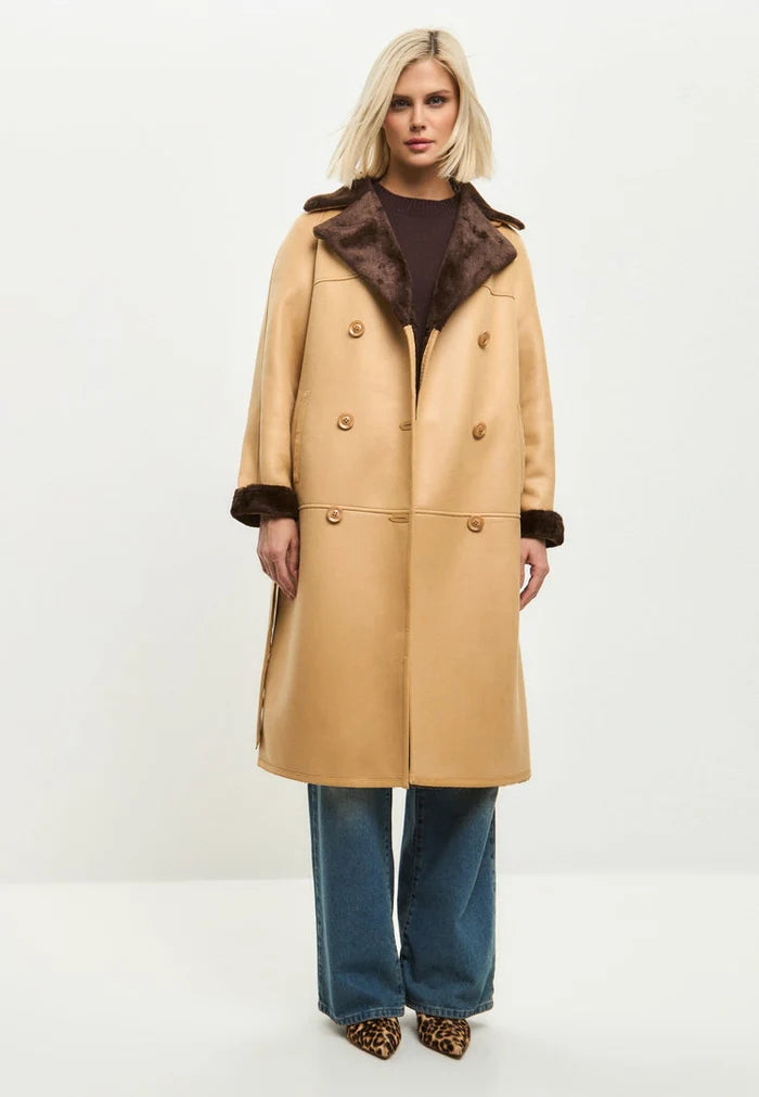 A stylish reversible faux fur coat in light brown, perfect button-up outerwear for women's fashion.