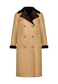 A fashionable women's reversible long coat in light brown, featuring faux fur and a button-up design - perfect for winter styling.