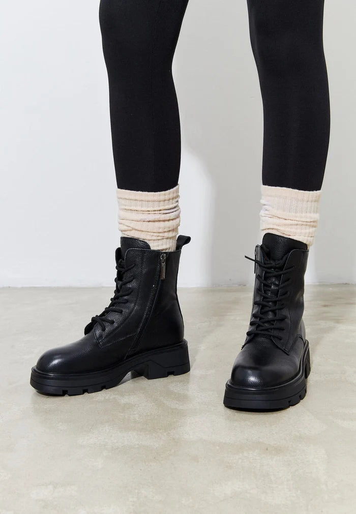 A pair of stylish black ankle boots for women, featuring casual lace-up design, perfect for everyday wear.