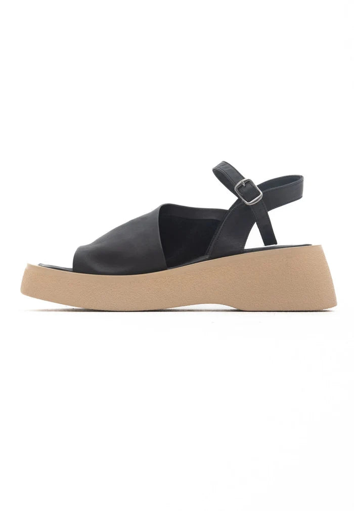 A pair of stylish black women's platform sandals, perfect for a casual and comfortable look.