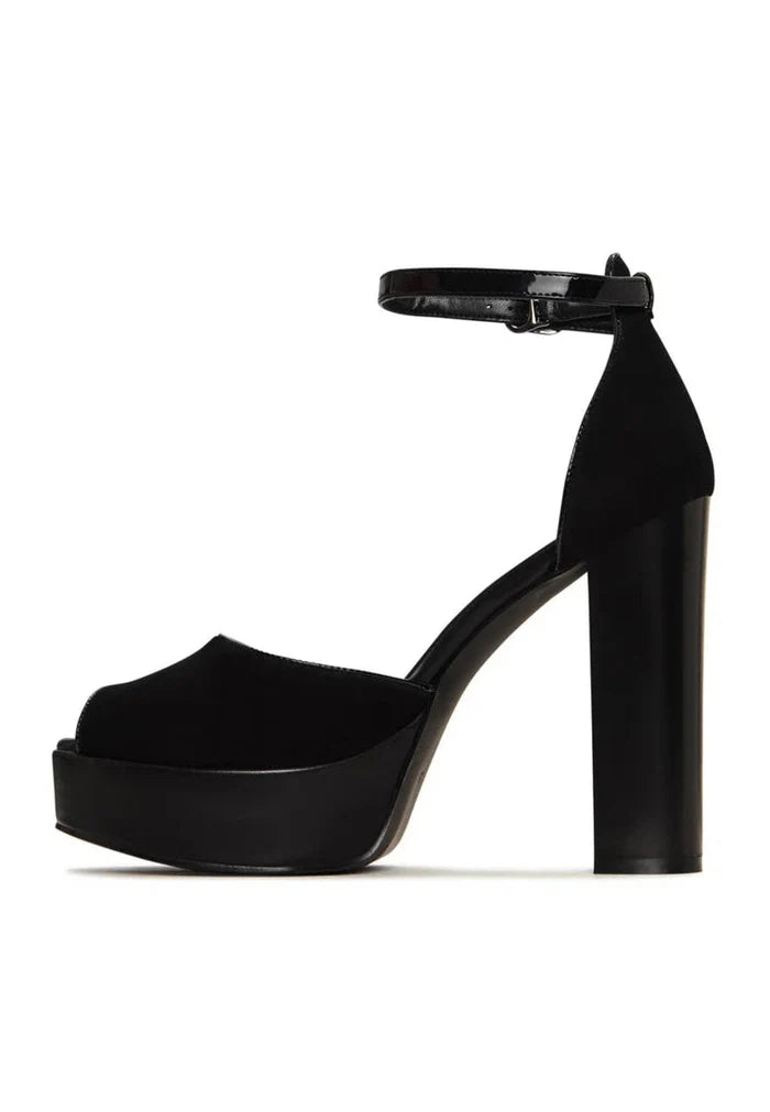 A chic pair of black block heel pumps, the perfect fashionable choice for women's block heel shoes.