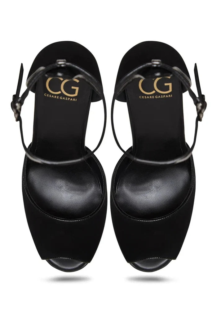 A stylish pair of women's black block heel pumps, the perfect fashionable choice for any outfit.
