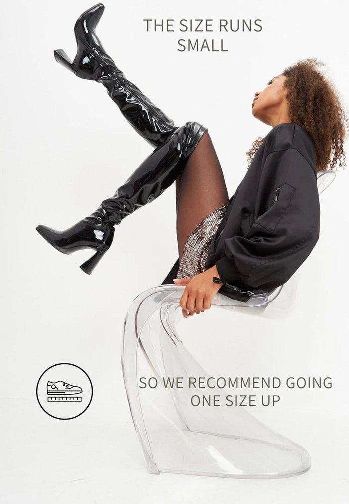 A woman wearing chic and comfortable black over-the-knee boots, the perfect fashionable choice for women's knee-high boots.