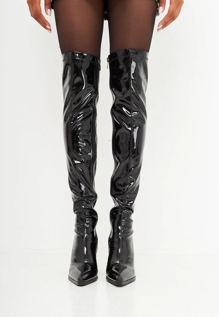 A stylish and comfortable pair of black over-the-knee boots for women, perfect for adding a fashionable touch to any outfit.