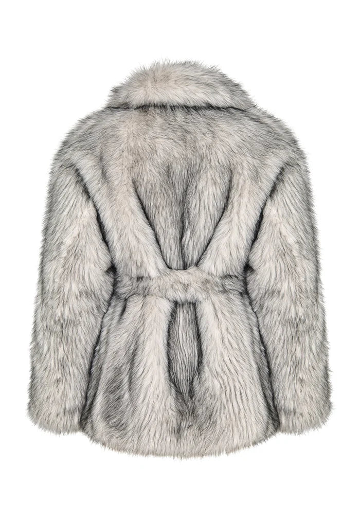 A chic white faux fur coat, a trendy winter essential for fashionable outerwear enthusiasts.