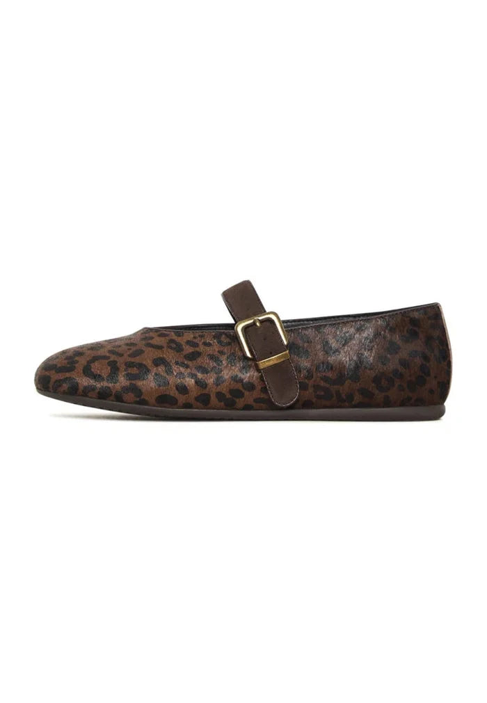 A stylish pair of leopard flats shoes, chic Mary Jane style with trendy animal print design for fashionable women.