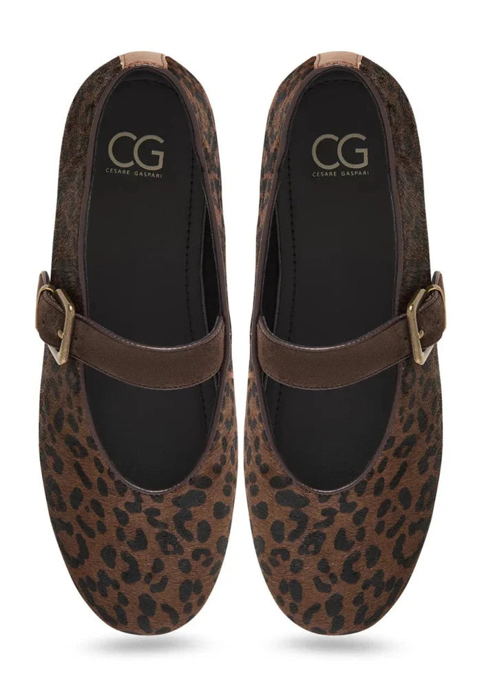 A pair of chic Mary Jane flats in trendy leopard print, perfect for fashionable women looking for stylish and comfortable footwear.