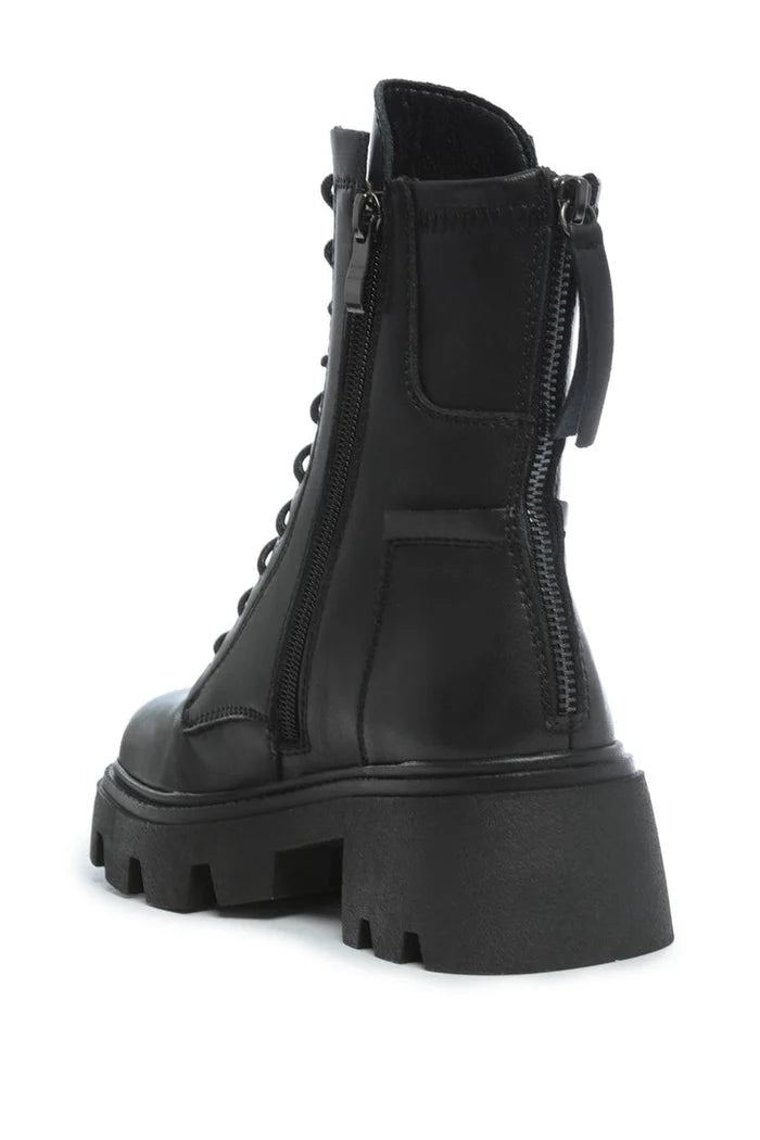 A pair of chunky leather combat boots with laces, perfect for a rugged and stylish look.