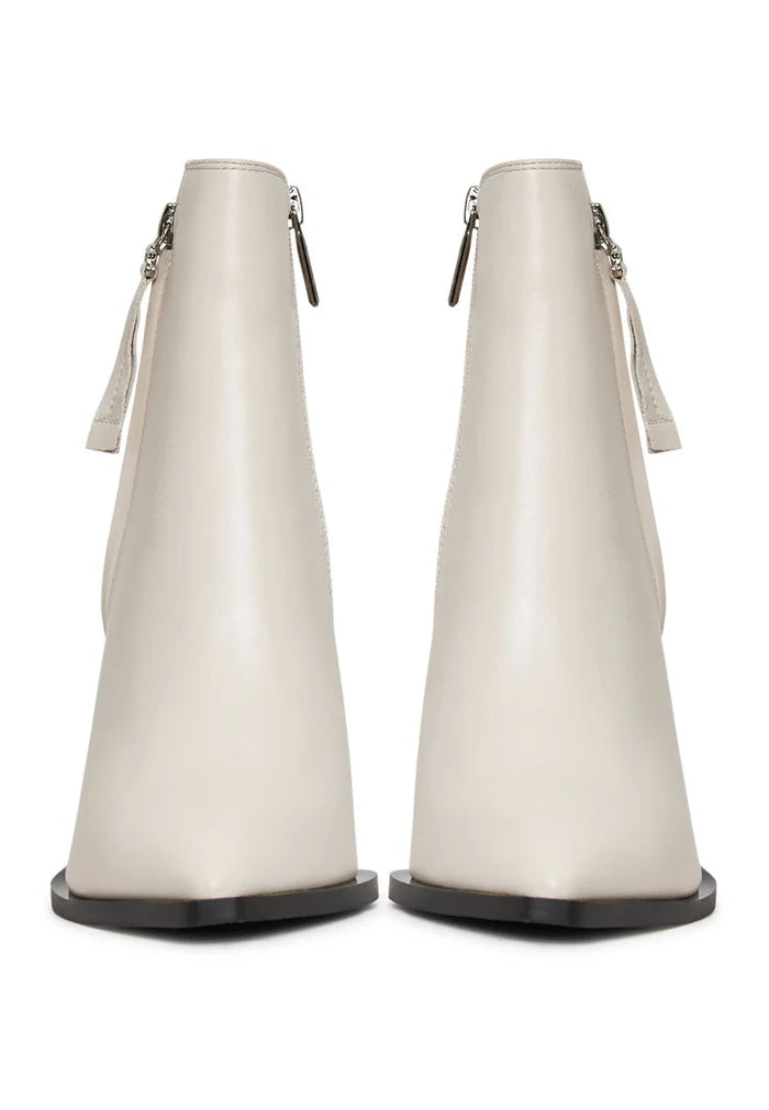 A stylish pair of designer leather ankle boots in classic beige, a must-have in women's footwear fashion.