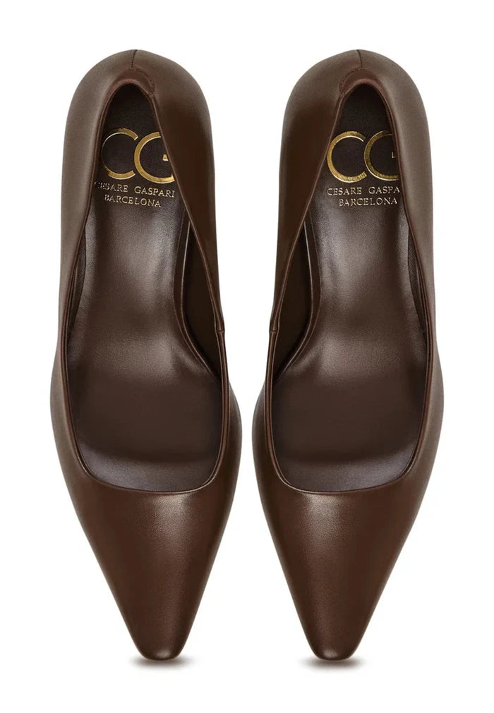 A pair of elegant dark brown leather pumps, a classic choice in women's footwear for fashion-forward looks.