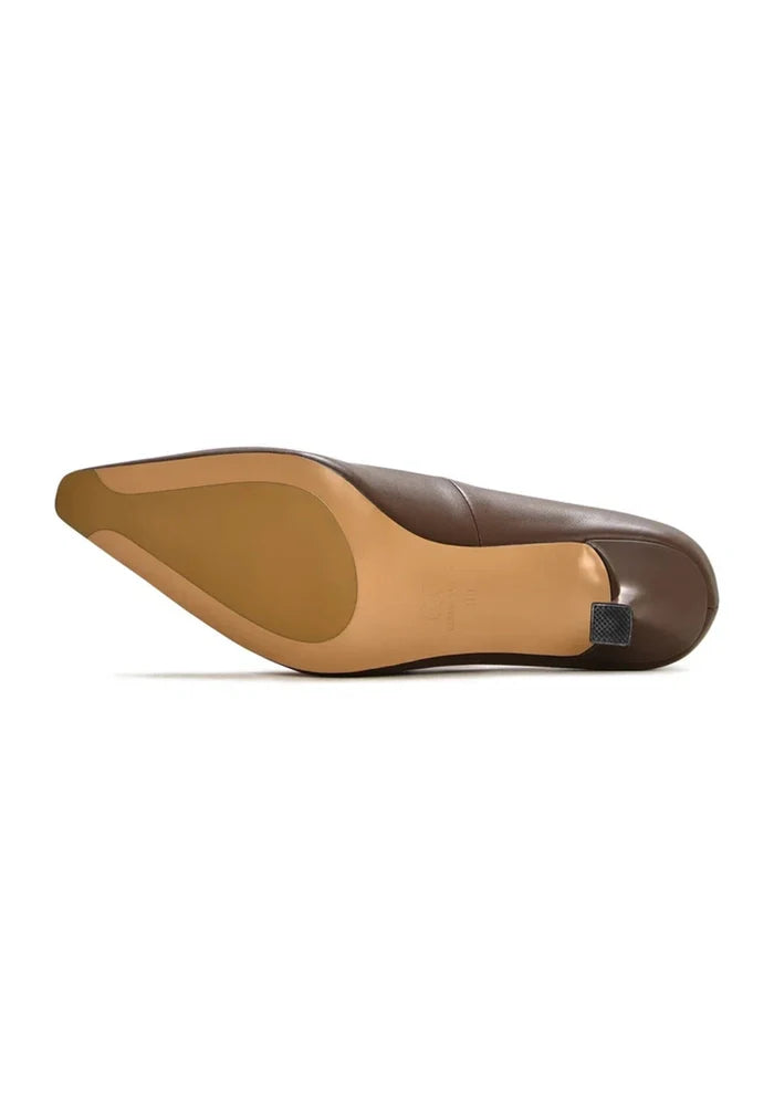 A pair of dark brown leather pumps, classic and fashionable women's footwear, perfect for any occasion.