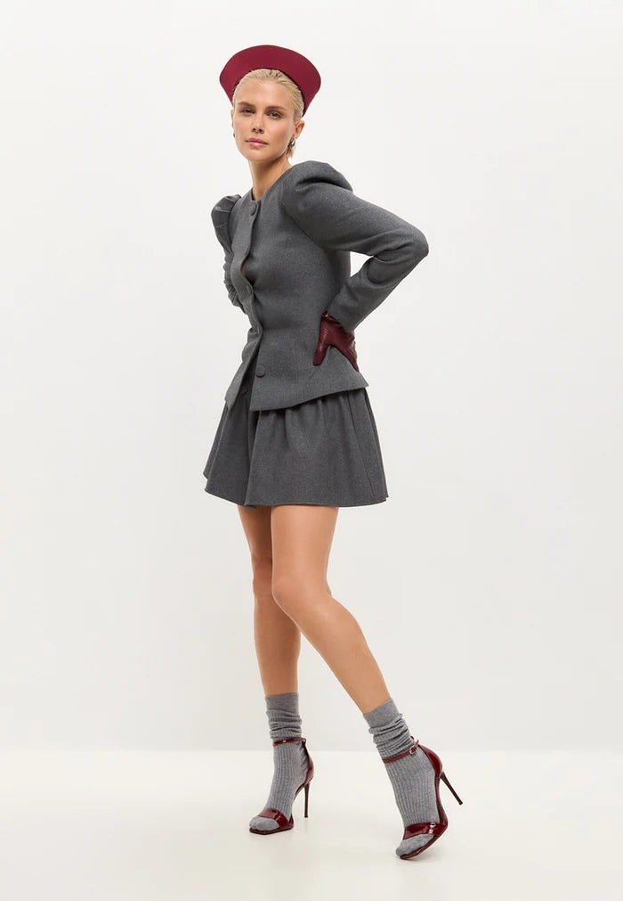 A sophisticated pair of patent leather, ankle-strap, classic red high heels for women - the epitome of fashion footwear.