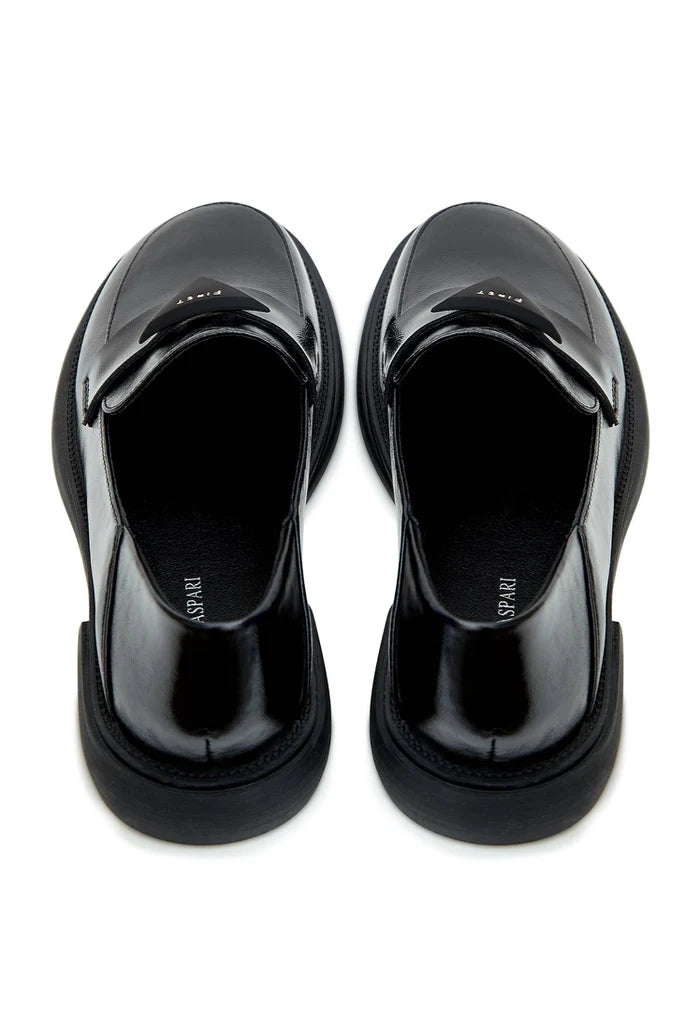 A stylish pair of black slip-on loafers for men, the perfect classic addition to any outfit.