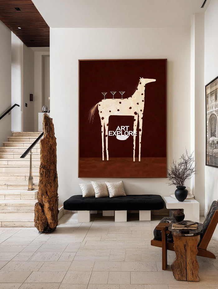 A large vertical wall art piece featuring a stylized beige giraffe on a dark brown background, displayed in a modern interior setting above a black bench.
