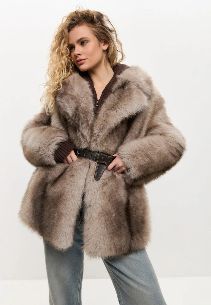 A stylish and luxurious women's faux fur coat in brown, perfect for winter outerwear fashion.