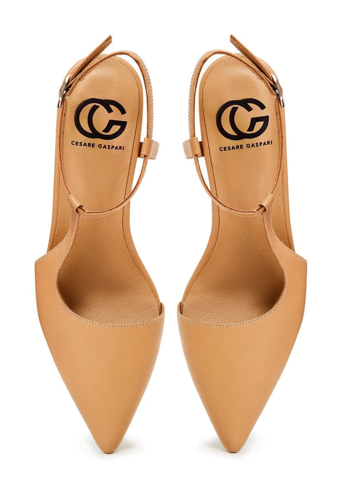 A pair of elegant pumps in beige, luxe designer heels, fashionable stilettos perfect for any special occasion.