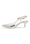 A pair of elegant silver pumps, the epitome of luxe footwear for women in high-end fashion.