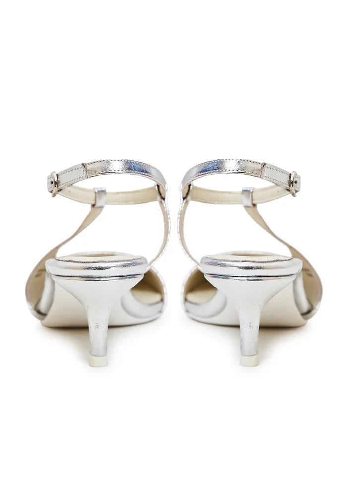A pair of elegant silver pumps, perfect for adding a touch of luxury to any outfit.