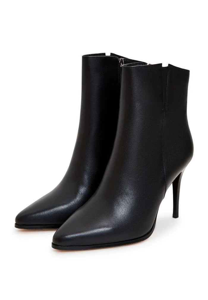 A stylish pair of black leather heeled boots with elevated heels, perfect for adding a fashionable touch to any outfit.
