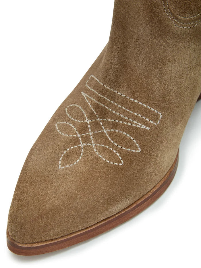 A stylish pair of handcrafted light brown cowboy boots with unique embroidered details, perfect for a western-inspired look.