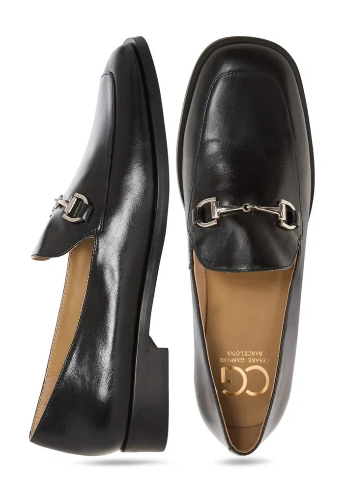 A stylish pair of equestrian chic black loafers, the perfect fashionable and trendy equestrian footwear.