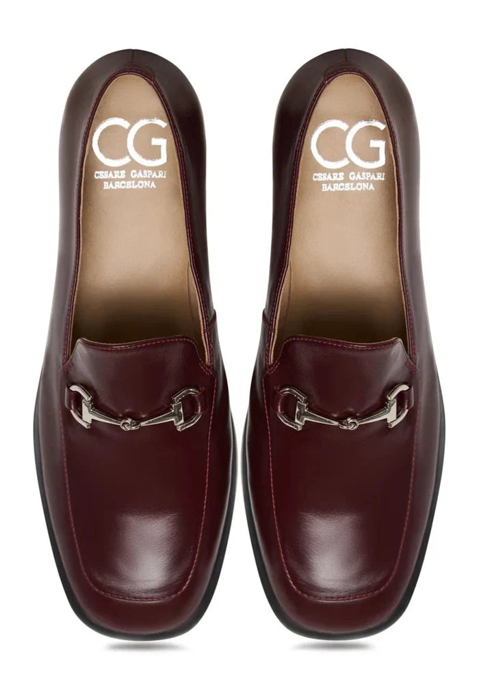 Stylish Bordeaux loafers, the epitome of equestrian chic footwear for a fashion-forward look.