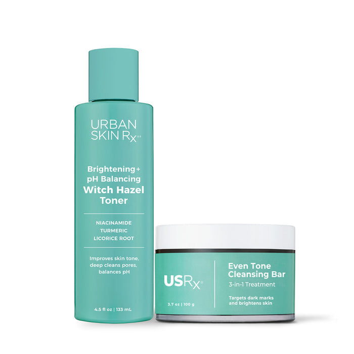 Bottles of USRx witch hazel toner and even tone cleansing bar on a white background