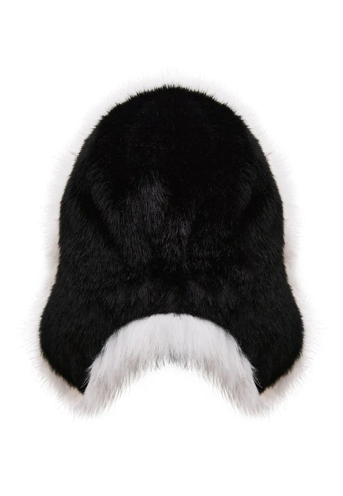 Stylish black and white faux fur hat, perfect for winter fashion and adding elegance to any outfit.