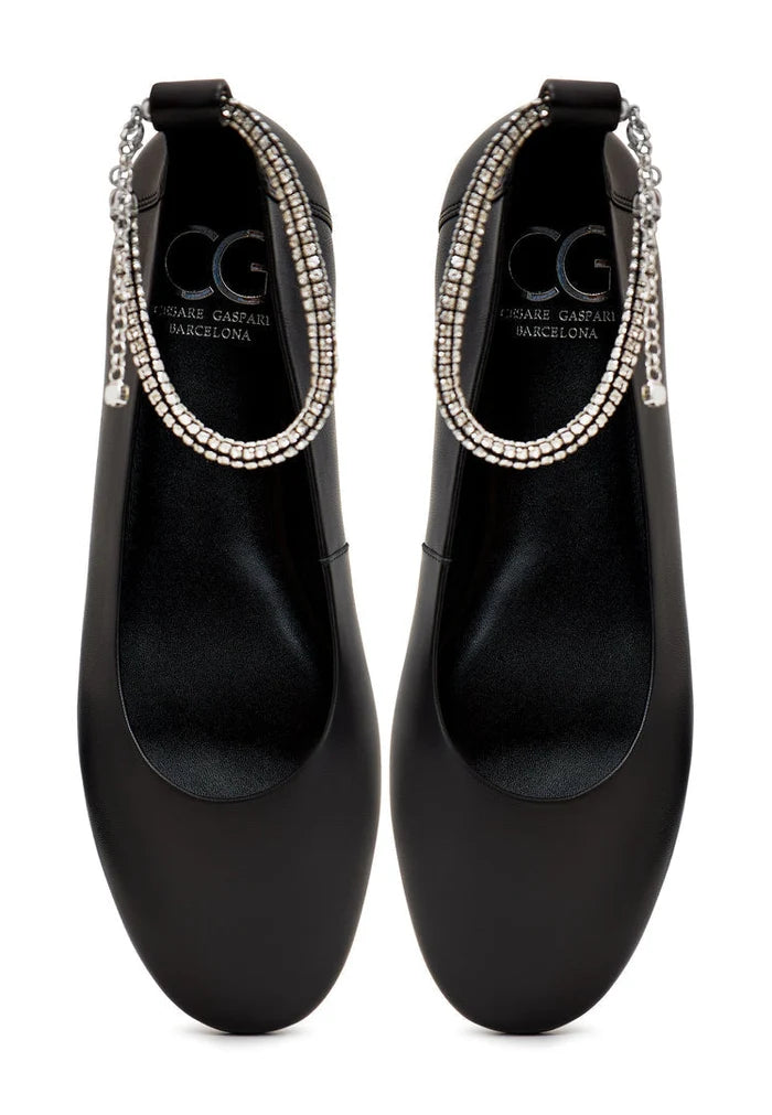 A stylish and comfortable pair of Lola ballerinas, featuring a flat sole design perfect for everyday wear.