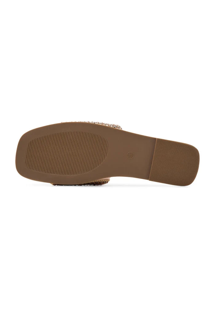 Pair of Izzy gold flat sole women's slippers, comfortable and stylish for everyday wear.