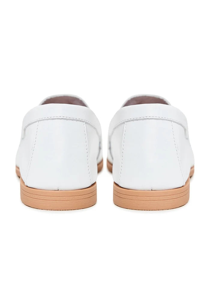 A pair of high-quality white leather loafers, perfect for any occasion, from casual to formal.