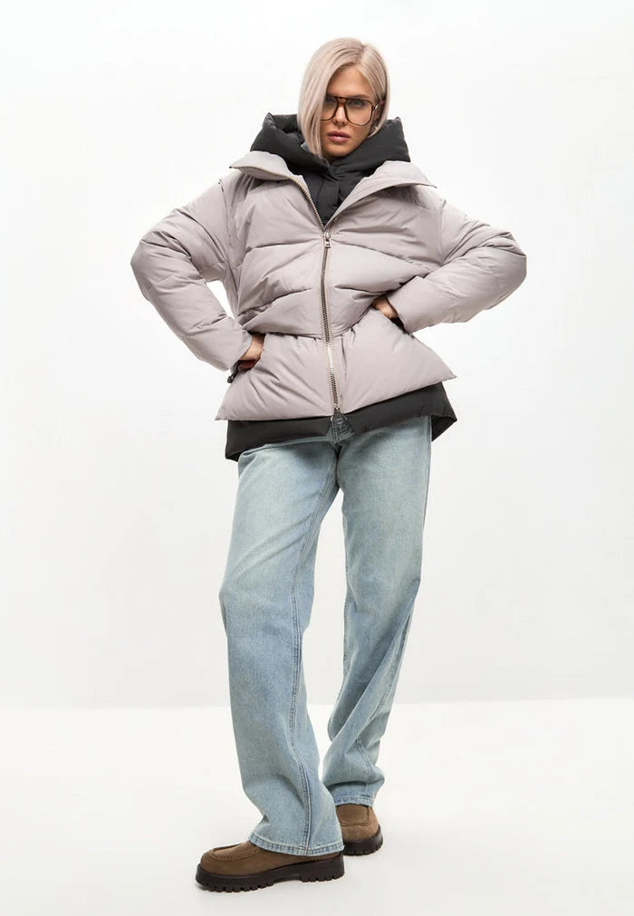 A stylish and fashionable beige hooded puffer jacket, perfect for winter and women's outerwear.