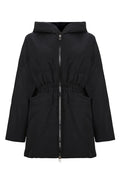 A stylish black hooded quilted jacket for women, perfect for winter wear.