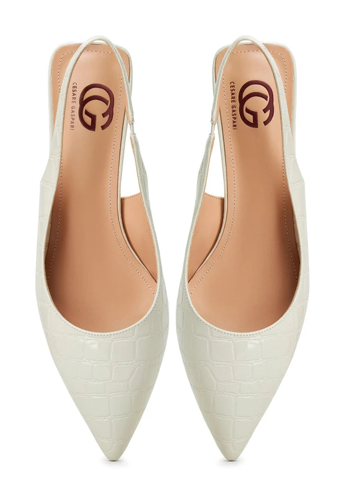 A pair of elegant off-white stiletto heels pumps, perfect for adding a touch of sophistication to women's footwear fashion.