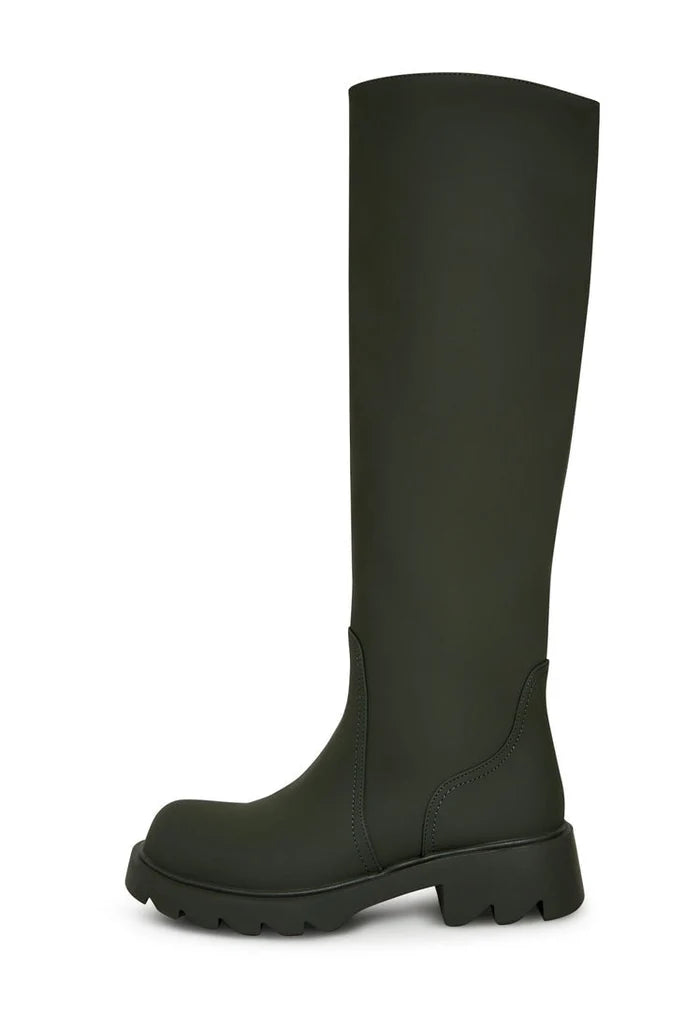 A pair of trendy knee-high green boots with a chunky sole, perfect for women's fashion footwear.