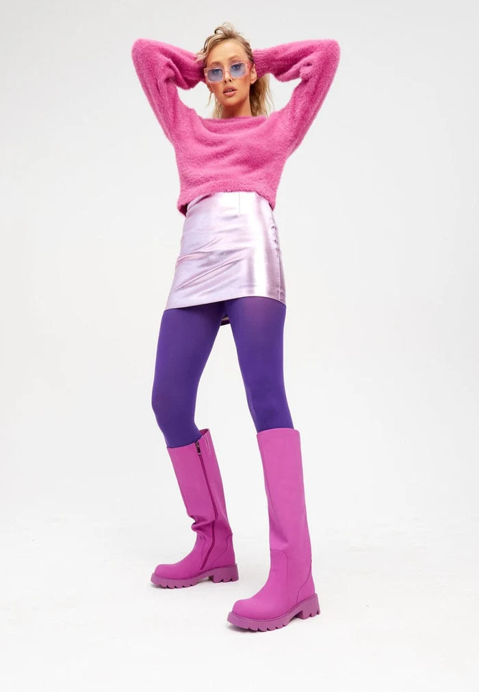 A pair of trendy pink knee-high chunky sole boots, perfect for women's fashion footwear.