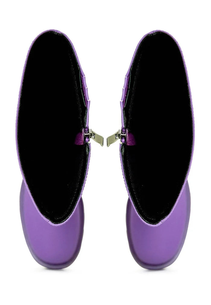 A stylish pair of knee-high chunky sole purple women's fashion boots.