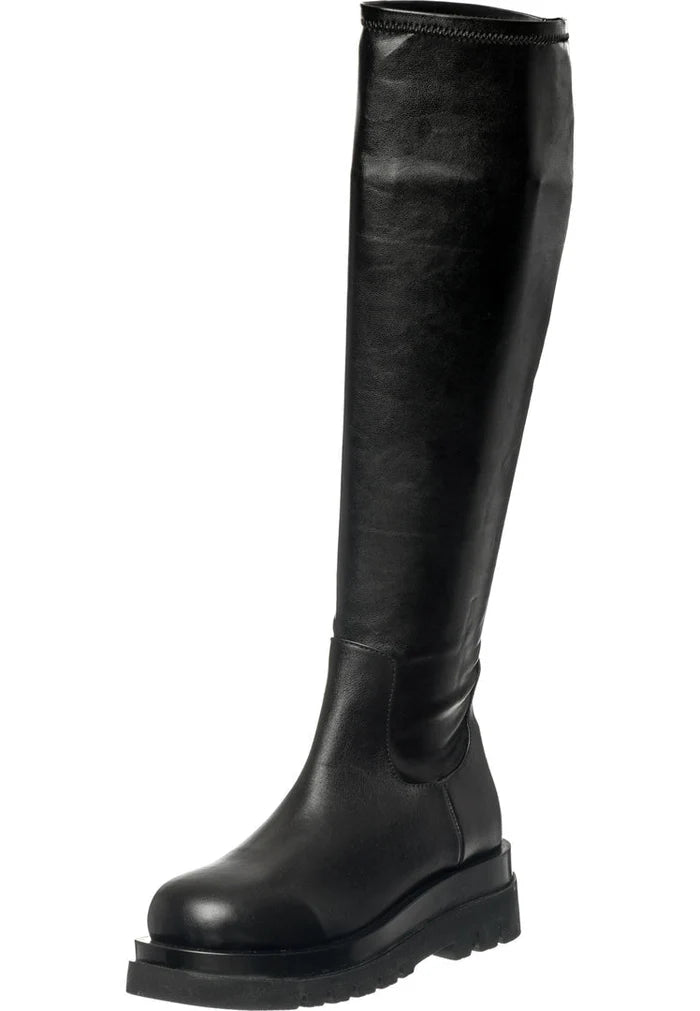 A stylish pair of women's knee-high leather lug boots, perfect for adding a touch of fashion and the latest trend to your outfit.