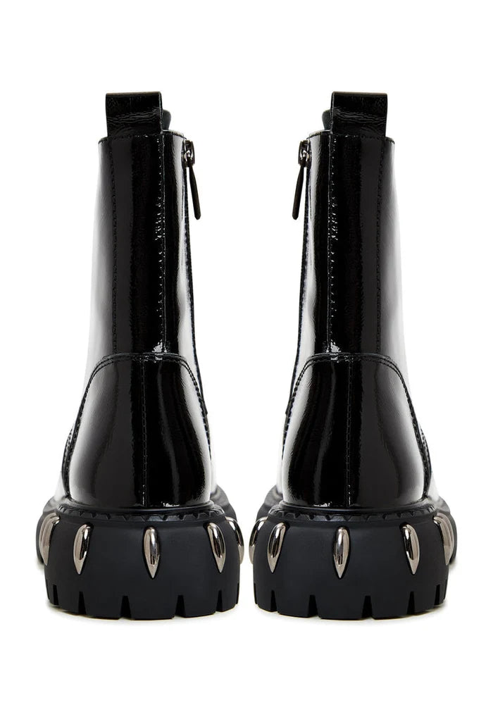 A pair of black lace-up combat boots with chunky soles, perfect for adding an edgy touch to any outfit.