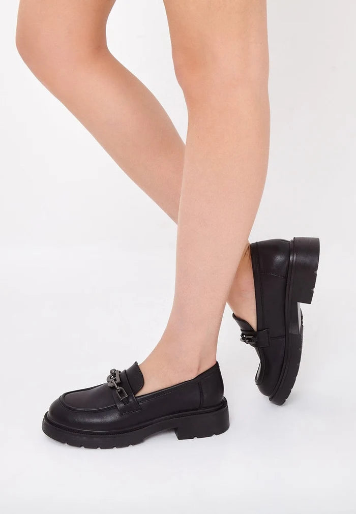 A fashionable pair of black leather loafers with block heels for women's footwear.