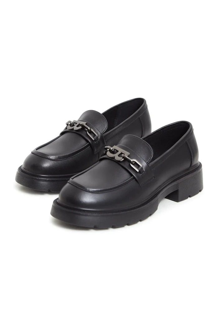 A stylish pair of black leather loafers with block heels, ideal women's footwear for a fashionable look.