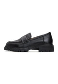 A stylish pair of women's block heeled leather loafers, perfect for adding a touch of sophistication to any outfit.