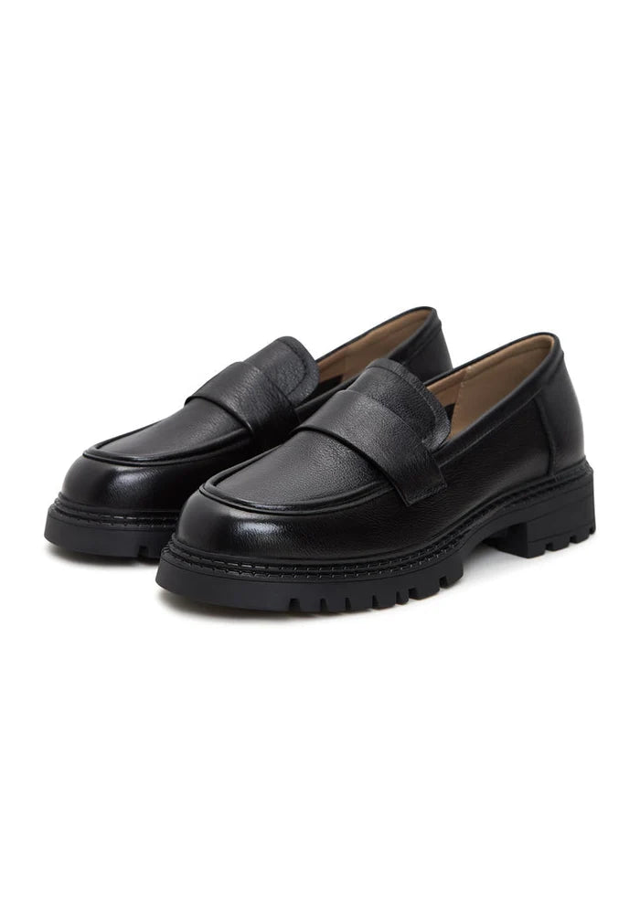 A stylish pair of women's block heeled leather loafers, perfect for dressing up any outfit.