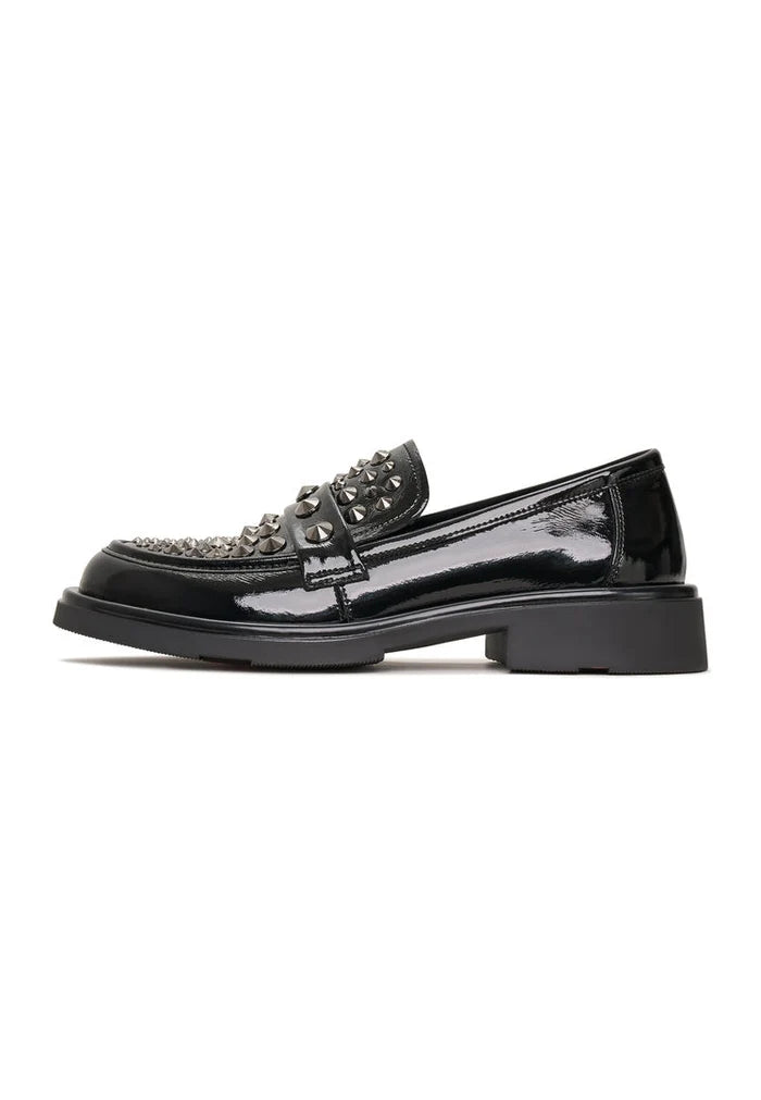 A pair of rockstar-inspired black leather loafers, perfect for men's fashion footwear, showcasing stylish loafers.
