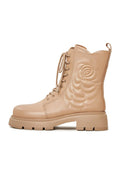 A stylish pair of women's beige leather ankle platform boots, ideal for fashion-forward footwear enthusiasts.