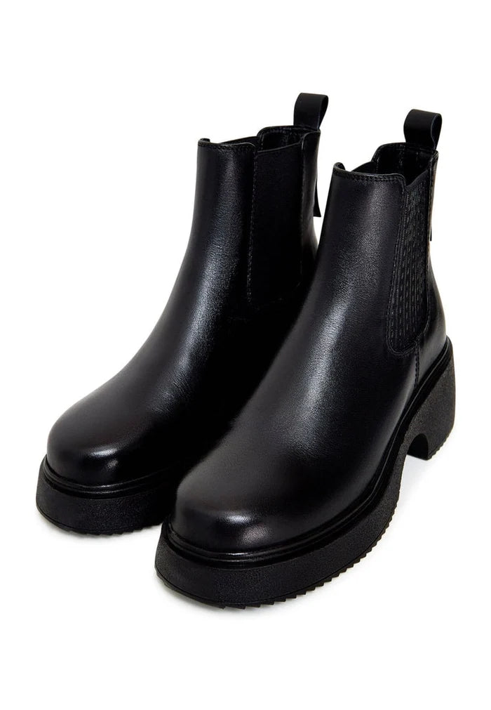 A stylish pair of black leather platform ankle boots for women, featuring high heels and a fashionable design.